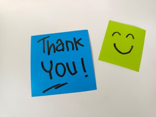 Thank You text word on the sticky notes paper isolated on white. Gratitude concept. 