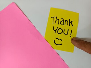 Thank You text word on the sticky notes paper isolated on white. Gratitude concept. 
