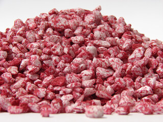 pile of partially red painted rocks
