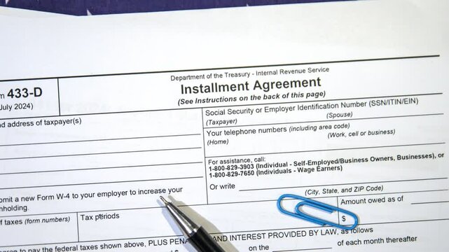 Installment Agreement form 4k footage with USA flag and space on paper. 433 D form video