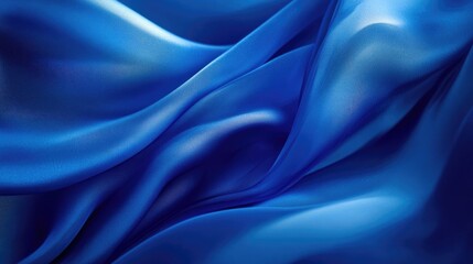 Obraz premium Elegant blue silk fabric flowing in the wind, smooth texture and rich color, close-up