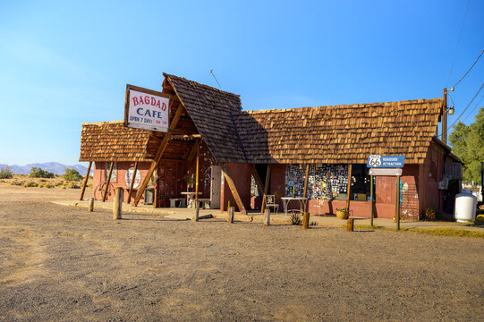 Newberry Springs, California, USA - November 04, 2023 : Historic Bagdad Cafe from the 1960s along the Route 66 in Newberry Springs, California, with rustic architecture and a Route 66 roadside sign.