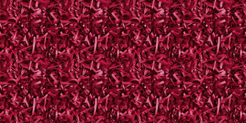 Fototapeta premium shredded paper filler in deep red color with thin, delicate strips