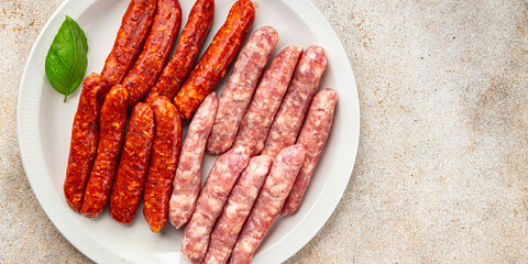 sausages meat raw beef, pork, chicken, lamb dish fresh delicious gourmet food background on the...