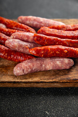 sausages meat raw beef, pork, chicken, lamb dish fresh delicious gourmet food background on the table rustic food top view copy space