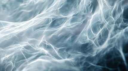 Obraz premium Abstract close-up of textured swirling blue and white waves in motion