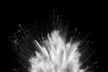 Explosion of colored powder and dust smoke splash white on black background