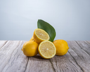 Fresh and aromatic freshly cut lemons on the table