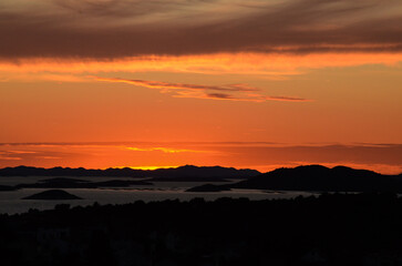 sunset form&aacute;ban the mountains by the sea
