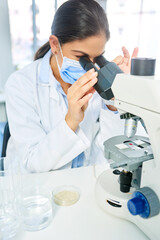 Petri dish, vaccine or woman testing with microscope, clinical trial or science discovery for dna...