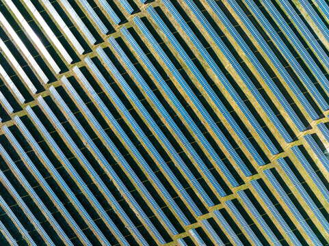 Aerial view of Rows of solar panels at a photovoltaic plant near Espejo. Aerial view. Drone shot. C&oacute;rdoba province, Andaluc&iacute;a, Spain.