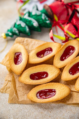 Christmas cookies strawberry jam boat shape sweet cookies delicious baked goods Christmas background holiday fresh meal food snack on the table copy space food background rustic top view