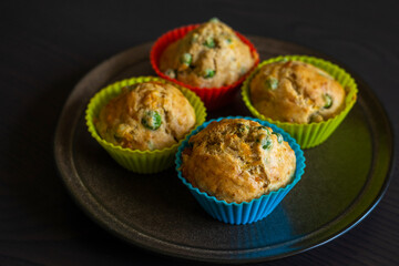  Savory Muffin with Pea, Ham, and Cheese Close-Up on Dark Background