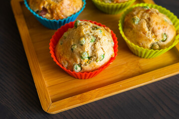  Savory Muffin with Pea, Ham, and Cheese Close-Up on Dark Background