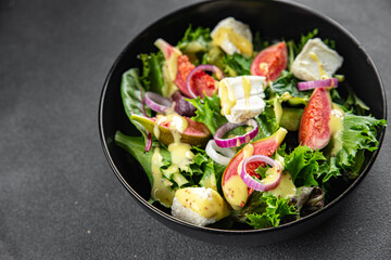 fig salad green lettuce, figs, soft cheese fresh meal food snack on the table copy space food background rustic top view keto or paleo diet vegetarian vegan food