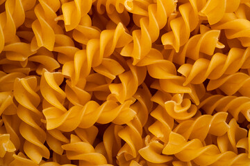 uncooked trivelle pasta for background.Top view