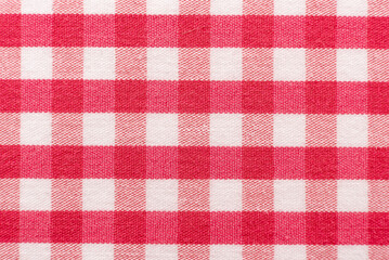 The texture of linen fabric in a large cage of pink  and white. Scottish tailoring material....