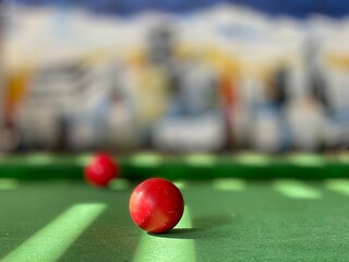 billiard balls on the green grass