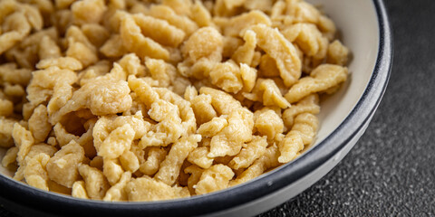 spaetzle egg pasta irregular shape fresh meal food snack on the table copy space food background rustic top view