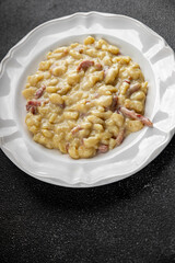 spaetzle egg pasta irregular shape fresh meal food snack on the table copy space food background rustic top view