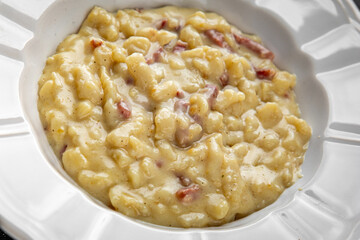 spaetzle egg pasta irregular shape fresh meal food snack on the table copy space food background rustic top view