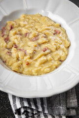 spaetzle egg pasta irregular shape fresh meal food snack on the table copy space food background rustic top view