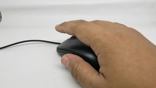 close up using a computer mouse on a white background click and move