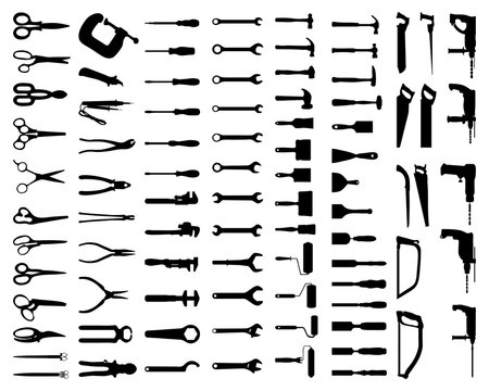 Set of black silhouettes of hand tools on a white background	