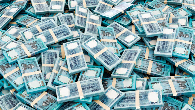 Pile of Bangladesh Currency Bundle-Stack of 100 Taka Notes, High-Resolution Currency Photo.