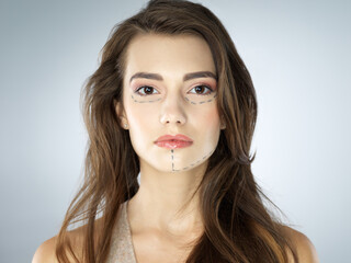 Fototapeta premium Beauty, portrait and woman with lines for plastic surgery, face transformation or skin treatment in studio. Skincare, dermatology or girl in prep for facelift, cosmetic procedure and white background