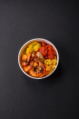 Boiled tiger shrimps with porridge, tomatoes and corn