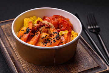 Boiled tiger shrimps with porridge, tomatoes and corn