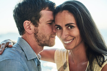 Fototapeta premium Happy couple, care and portrait with hug, bonding and holiday for anniversary or celebration. Married people, embrace and affection as partner in relationship for support, together and love in Italy