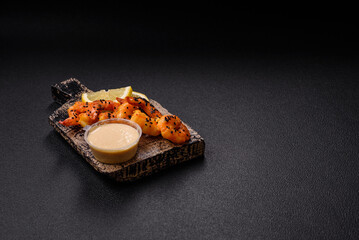 Boiled tiger prawns with white sauce and lemon