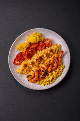 Boiled tiger shrimps with porridge, tomatoes and corn