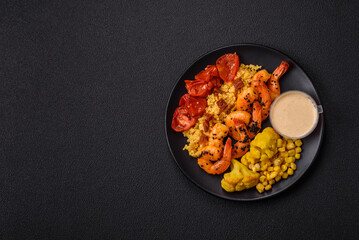 Boiled tiger shrimps with porridge, tomatoes and corn