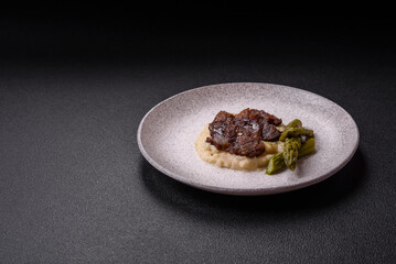 Juicy beef or pork cut into slices with boiled asparagus