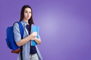 Fototapeta premium Happy pretty girl student on background