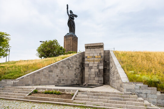 Gyumri, Armenia - July 20, 2024: memorial of Great Patriotic War and monument to Mother Armenia (Mair Hayastan) in Gyumri city on cloudy summer day