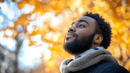 A candid shot of someone in a relaxed or thoughtful moment.