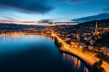Fototapeta premium Aerial timelapse of Zurich at night, featuring the twinkling lights of the city reflecting in Lake Zurich