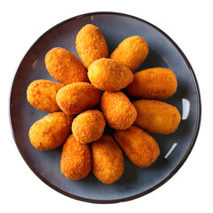 Zenith view of a dark plate with many fried croquettes. Transparent background.