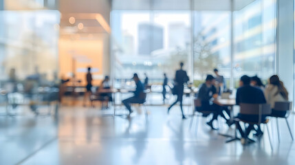 Blurred Abstract Background of People in a Modern Office Building, with a Large Window Looking Out onto the City Skyline, Creating a Sense of Movement and Activity
