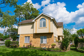 Residential property house. Residence architecture. Suburban neighborhood. Suburban house architecture. Private family house. Neighborhood architecture. Property in neighborhood