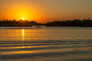 Setting sun over the bayou in League City, Texas, USA