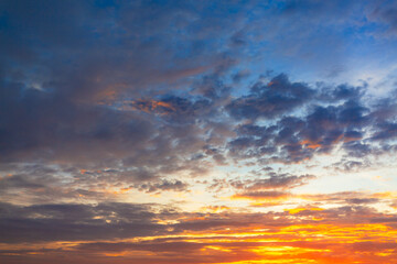Colorful clouds and sky,Dusk, Sunset Sky Clouds in the Evening with colorful Orange, Yellow, Pink and red sunlight and Dramatic storm clouds on Twilight sky,