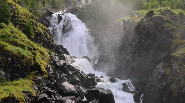 Latefossen Waterfall Odda Norway. Latefoss is a powerful, twin waterfall. Slow Motion in 4K.
