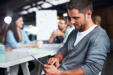 Fototapeta premium Business, employee and man with tablet in office for internet connection and communication. Boardroom, people and discussion on meeting for presentation, feedback and report for company growth
