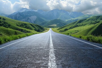 Obraz premium Empty asphalt road leading to the mountains in summer