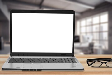 Fototapeta premium Laptop pc with blank screen on the office desk